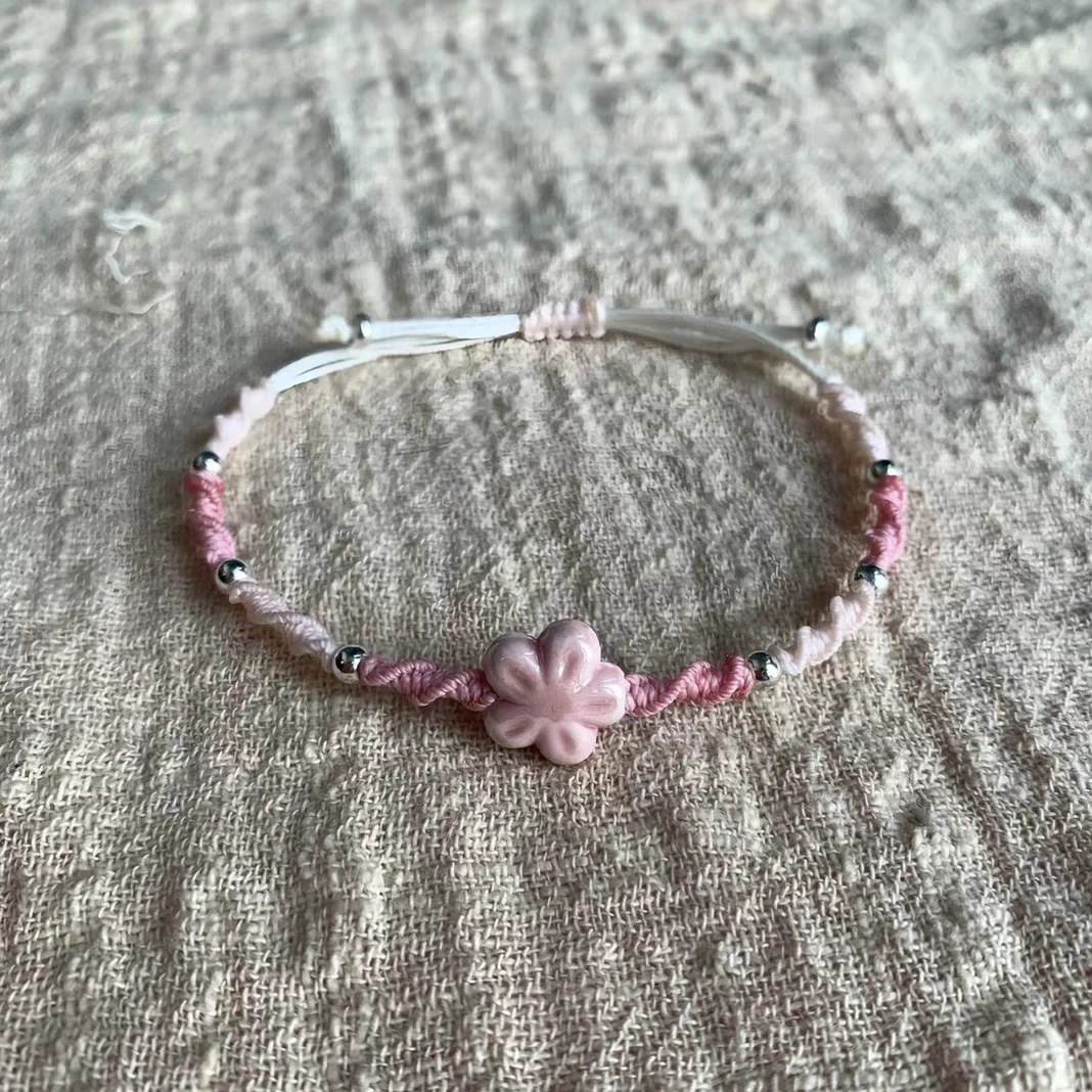 Bracciale fiore fortunato con  - Ceramic Link Bracelet recensione e prezzo